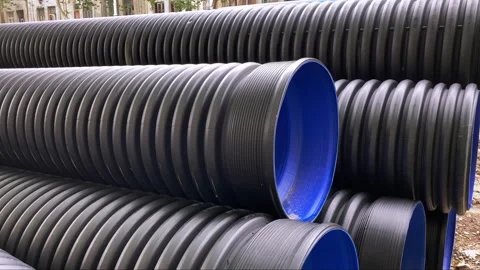 Close-up of large plastic corrugated pipes for water supply systems. Stock Footage 245342586