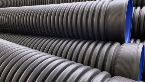Close-up of large plastic corrugated pipes for water supply systems. Stock Footage 248971907