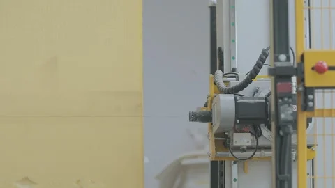 A close-up of a large polyurethane foam block being cut on a CNC machine 库存影片 342182050