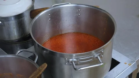 Close-up of a large pot of borscht in the kitchen of a restaurant or dining room Stock Footage 318139509