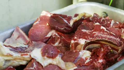Close-Up of Large Raw Meat Pieces for Plov in Metal Tray Stock Footage 332983886