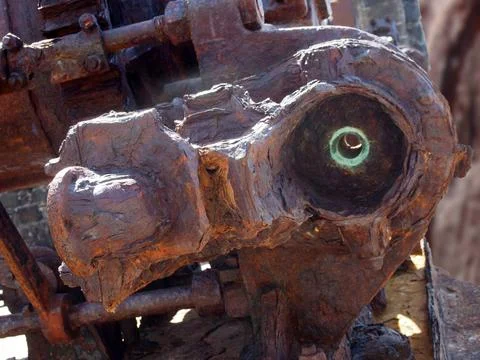  close up of a large rusting broken industrial engine with bolts and gears... 库存照片