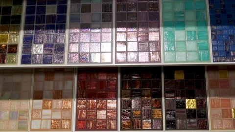 Close-up of a large selection of ceramic mosaic tile samples in the home decorat Stock Footage 123296249