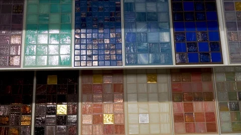 Close-up of a large selection of samples of ceramic mosaic tiles in the store of Stock Footage 123296250