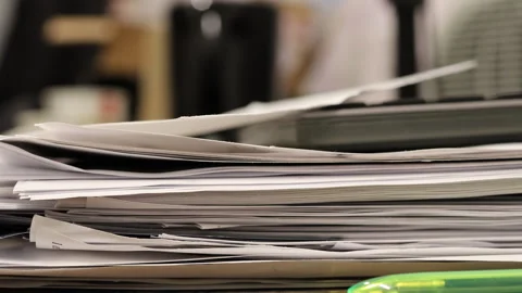 Close-up of a Large Stack of Documents on Office Desk 4K Stock Footage 328728103