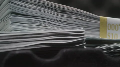 Close-up of Large Stack of Money in Briefcase Stock Footage 208801503