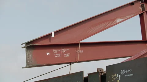 Close-Up Of Large Steel Beam Getting Installed 4K 48FPS SLO-MO Stock Footage 265802421
