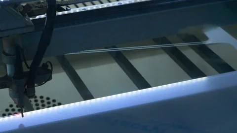 Close up on laser machine cutting plexiglas - end of the lockdown Stock-Footage 129559980