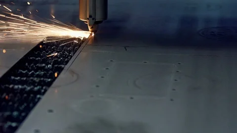 Close up of laser printer printing into steel plate in slow motion, Portugal Stock Footage 129066738