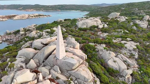Close Lateral Drone Shot Lighthouse Over Sea and Rocks Sardegna Italy Vídeo Stock 333634970