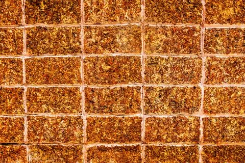 Close up laterite stone brick wall Stock Photos