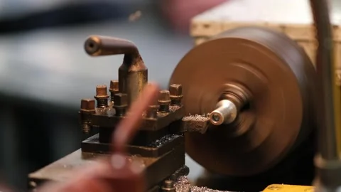 A close up of a lathe with a person working on it Video stock 335128679