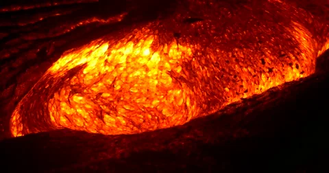 Close up Lava flowing from Kilauea volcano Hawaii at night Stock Footage