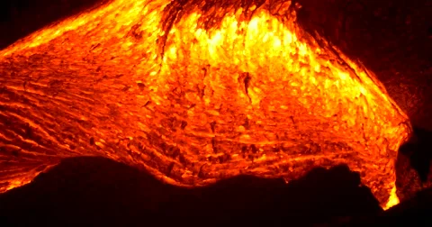 Close up Lava flowing from Kilauea volcano Hawaii at night Stock Footage 66545210