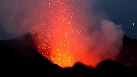 Close up of a lava fountain exploding from a volcano mouth. On the Stock Footage 105593666