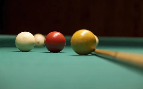 Close-up of the layers and cue for playing billiards. Stock Photos