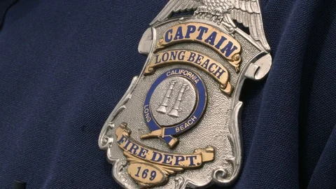 Close-up of LBFD captain badge Stock Footage 116473893