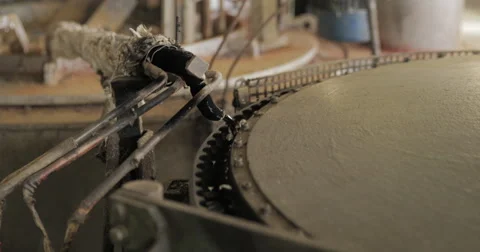 Close Up of Lead Pigs Being Cast and Coming out Industrial Casting Machine (4K) Video stock 60762231