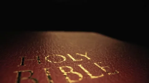 Close up of a leather bound Holy Bible book cover Stock Footage 341735830