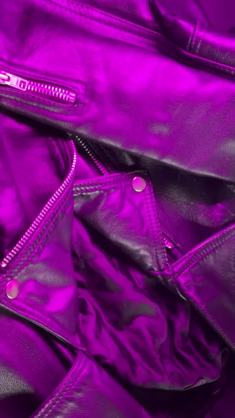 Close-up of Leather Jacket in Purple Lighting Vídeo Stock 306257762