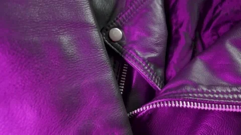 Close-up of Leather Jacket in Purple Lighting Stock Footage 306257764