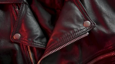 Close-up of a Leather Jacket in Shifting Red Light Stock Footage 301188182
