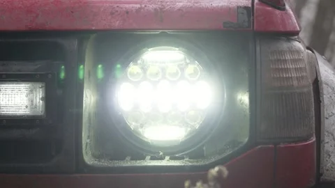 Close-up of the LED headlight of a dirty car. Stock Footage 267844160