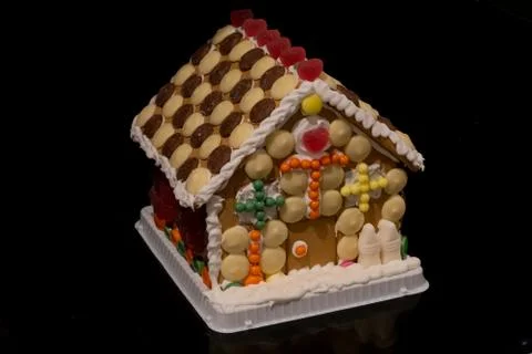 A close up of the left side of a gingerbread house Stock Photos