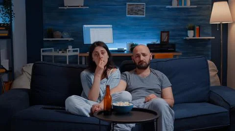 Close up of leftover food on table in empty messy living room Stockfoto's