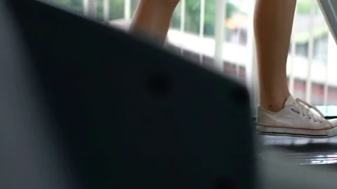 Close up leg of female warm up onwalking treadmil in sport centre Stock Footage 80475558