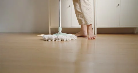 Close up leg woman with a mop home, Cleaning, Hygiene concept, Domestic Life 動画素材 335255053