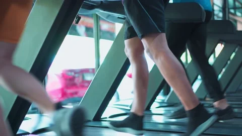 Close up legs of athlete exercise by running in Treadmill machine to lose weight Video stock 167850742