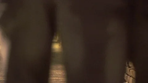 Close up on Legs of drunken men walking, stumbling on the street at night Video stock 74688245