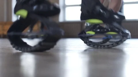 Close up of legs in kangoo jumping session. Training in the gym. Video stock 85458675