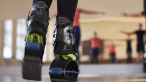 Close up of legs in kangoo jumping session. Training in the gym. Video stock 85458844