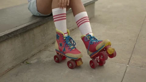 Close-up Of Legs Wearing Roller Skating Shoe, Outdoors Video stock 251915308