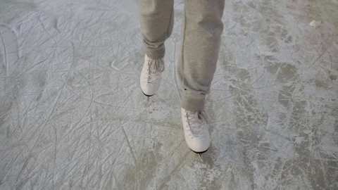 Close-up legs in white skates glide over the ice. winter sports 스톡 동영상 101674871