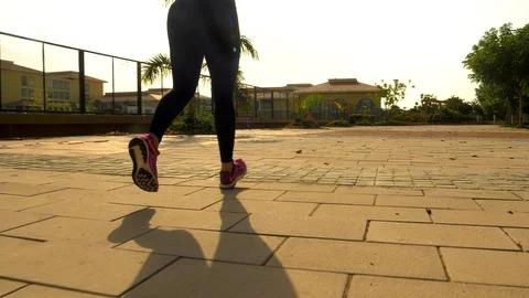 Close up of legs of a woman jogging Stock Footage 110313587