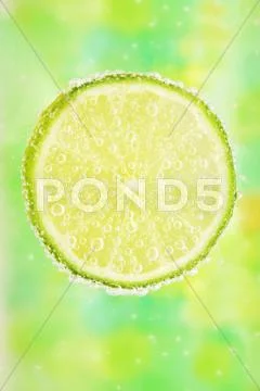 Close-up of a lemon with bubbles Stock Photos