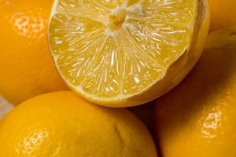 A close up of a lemon with the peel removed Stock Photos