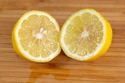 Close up of a lemon sliced in two. Stock Photos