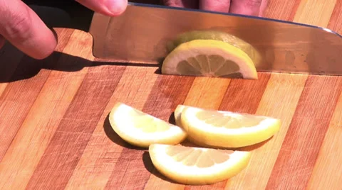 Close up on lemon slicing Stock Footage 39908714