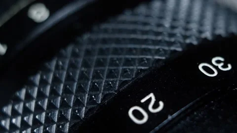 Close-up lens focus ring in the dark #1 Stock Footage 130390954
