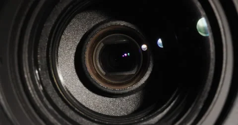 Close-up of lens lens, illuminated by a thin beam of light Stock Footage 146510972