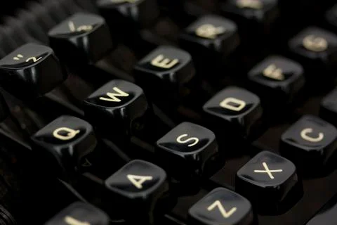Close up of lettered keys on an old typewriter. Stock Photos