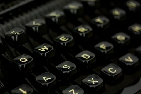 Close up of lettered keys on an old typewriter. Stock Photos