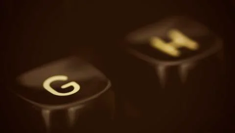 Close up of lettered keys on an old typewriter. Vintage filter applied. Stock Photos