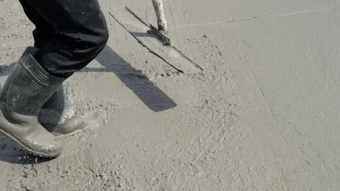Close-up of leveling a wet concrete surface with a tool. Tamping and smoothing Video stock 283085544