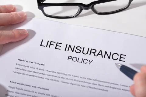 Close-up Of Life Insurance Policy Form Stock Photos