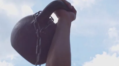 Close up of lifting weight. Sky background (BMCC 2.5K - 2400x1350) Vídeos de archivo 47966514